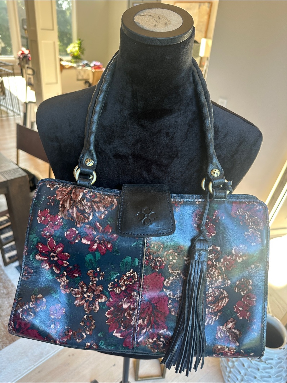 Patricia Nash Black Floral Leather Shoulder Bag with Tassel Accent